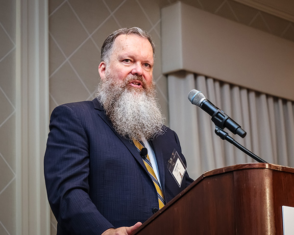 H-GAC Executive Director Charles Wemple speaking at a podium